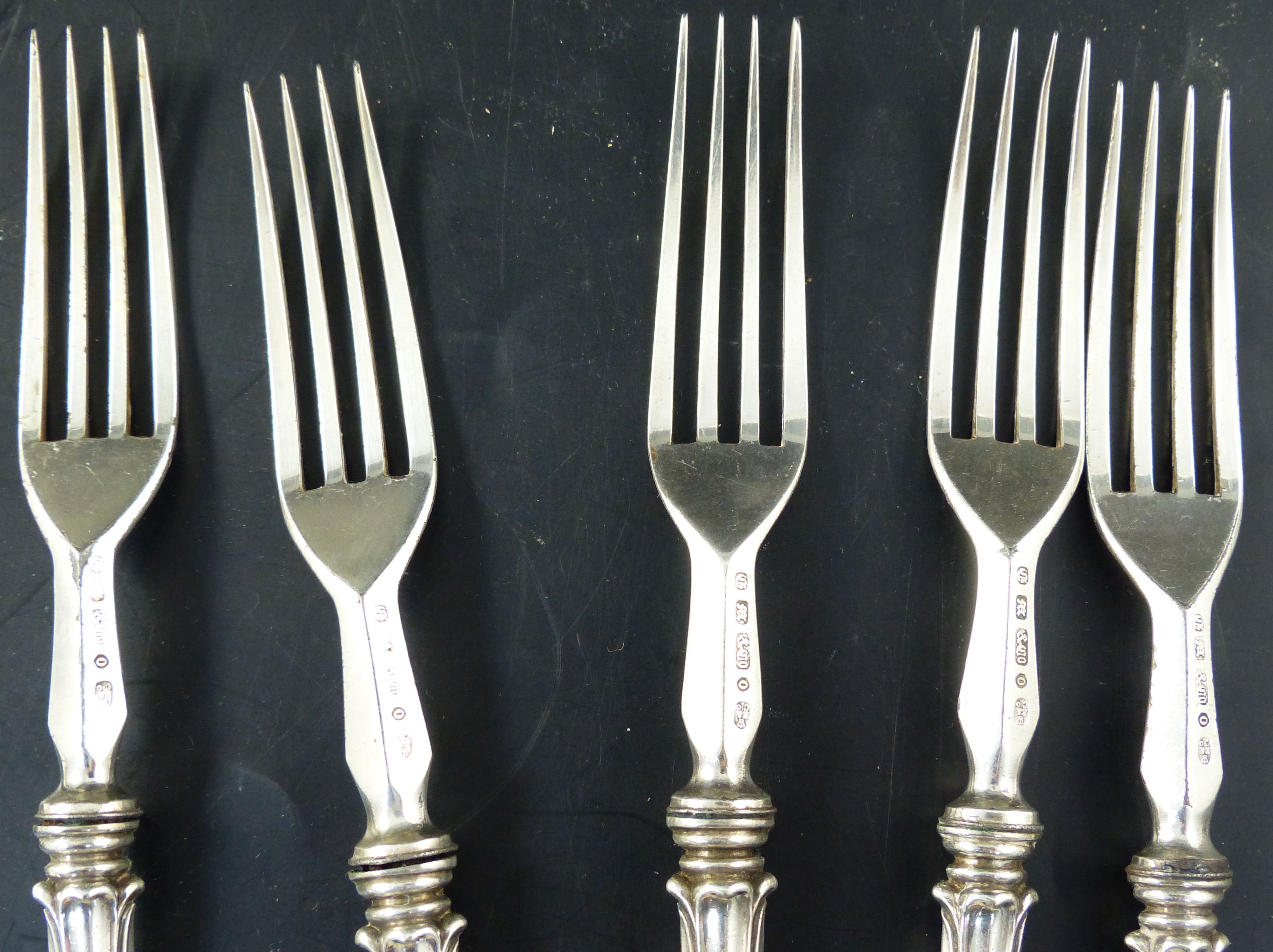 Mixed silver and plated cutlery